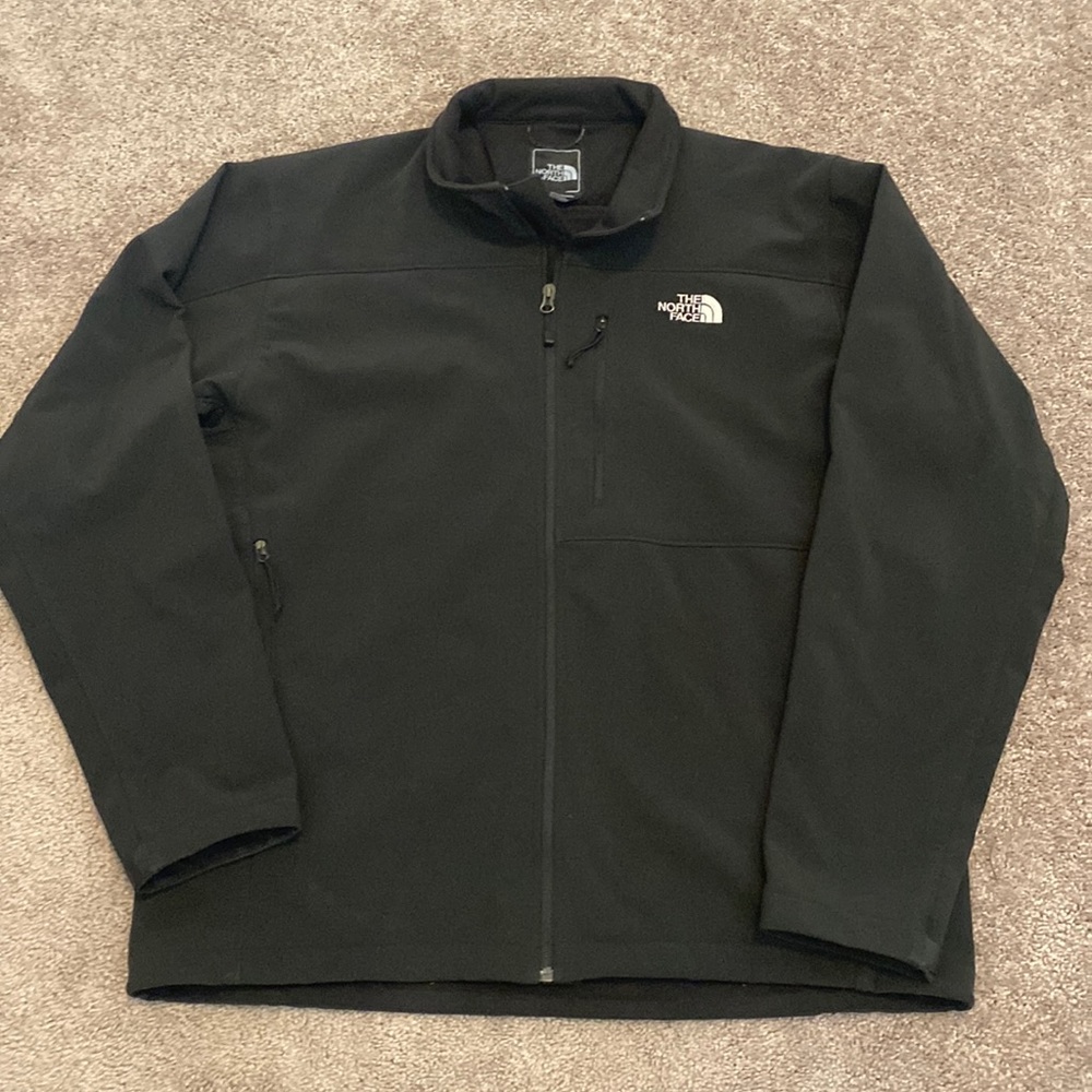 Mens black The North Face soft shell jacket.